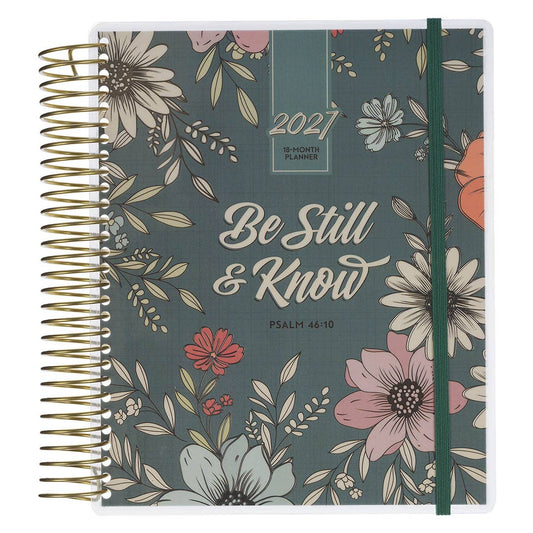 Planner with floral design and 'Be Still & Know' text on a green background