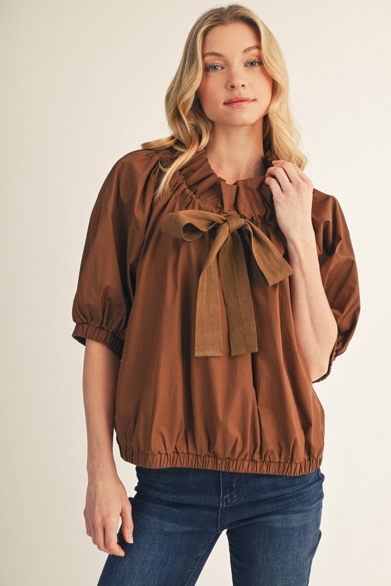 The Macyn Bow Drawstring Neckline Woven Top - Brown