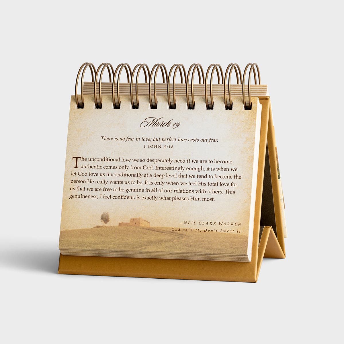 Desk calendar with spiral binding and stand on a white background