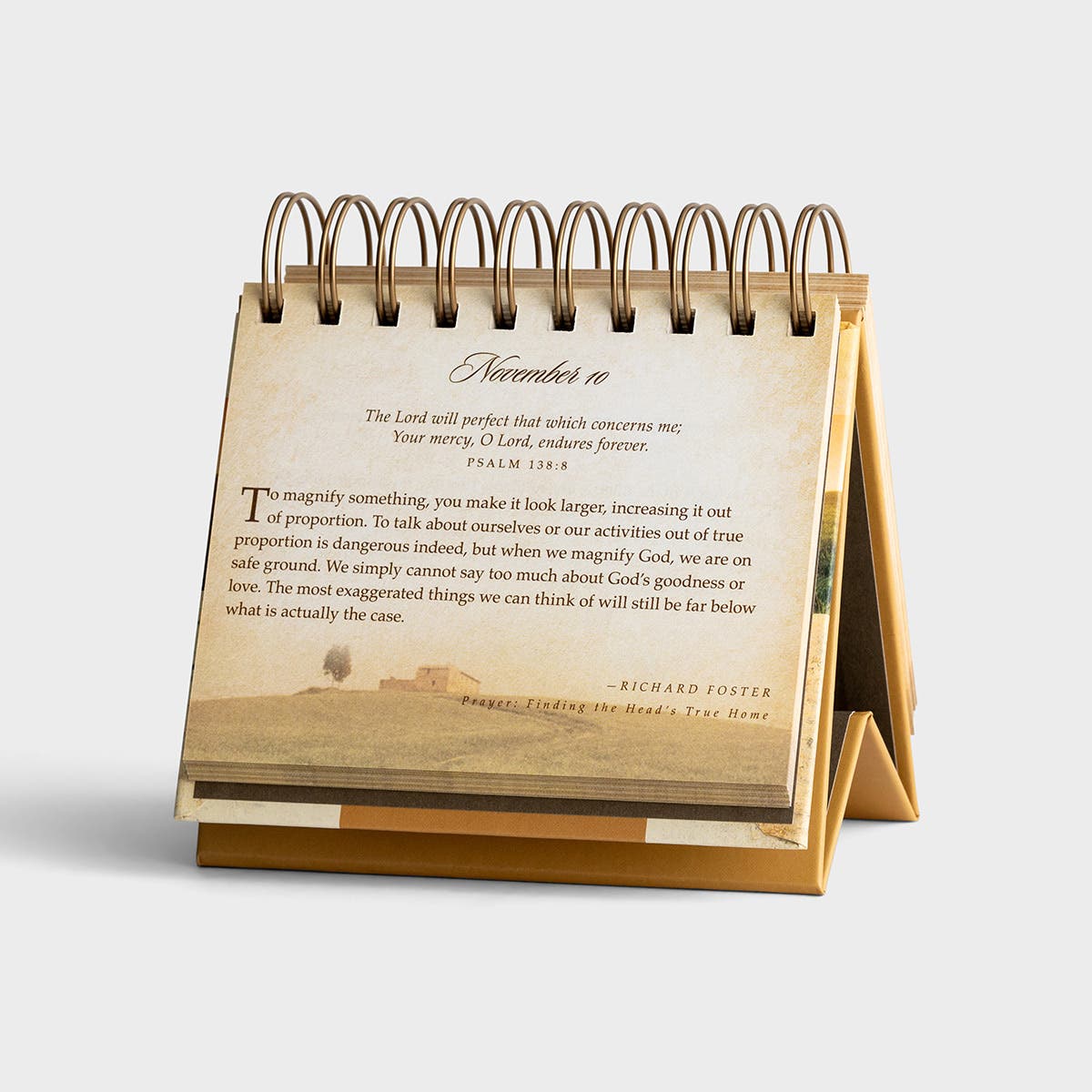 Desk calendar with religious text on a white background