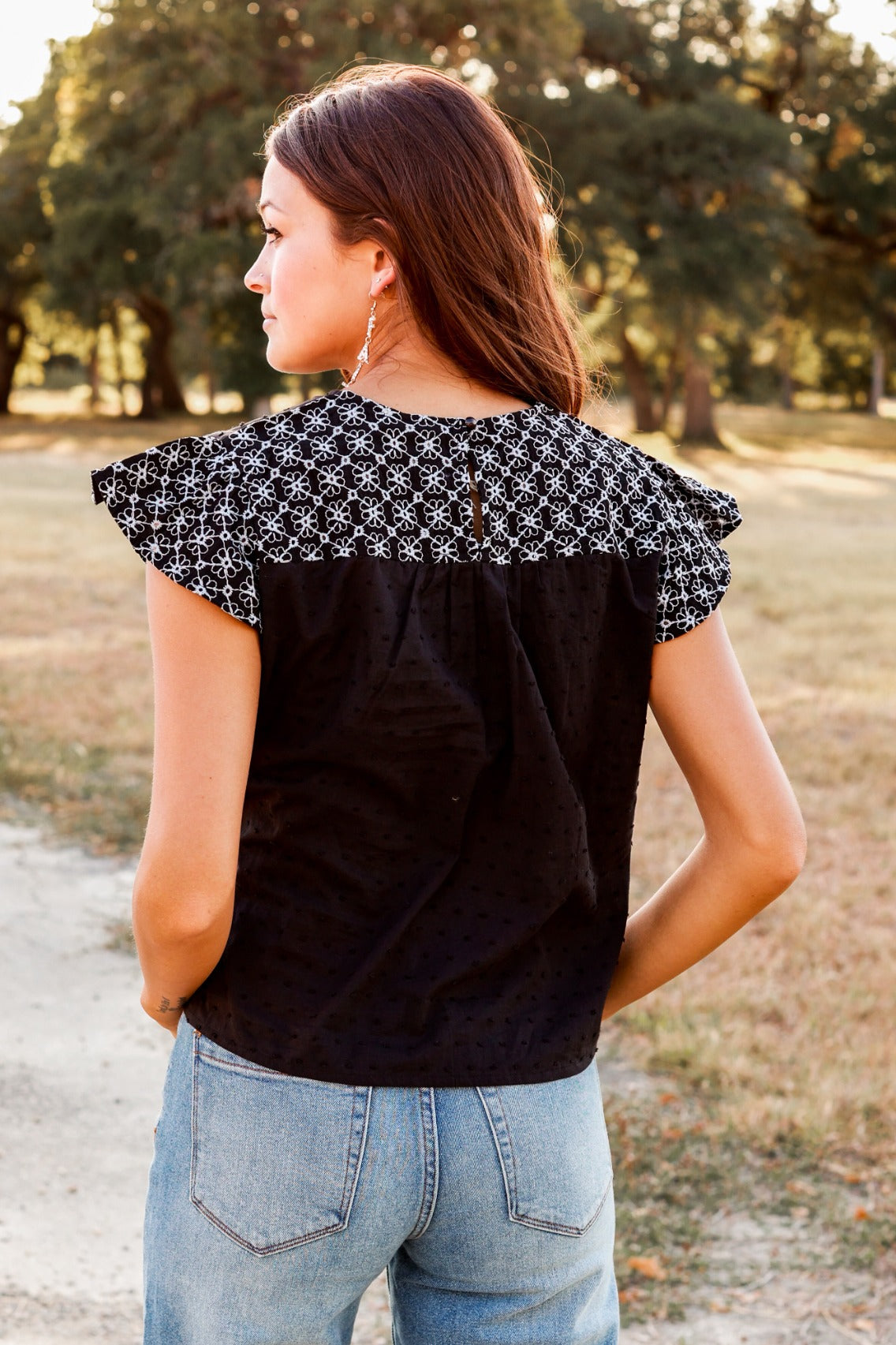FINAL SALE - The Step Above Ruffle Top - Black