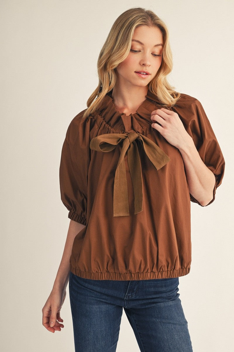 The Macyn Bow Drawstring Neckline Woven Top - Brown
